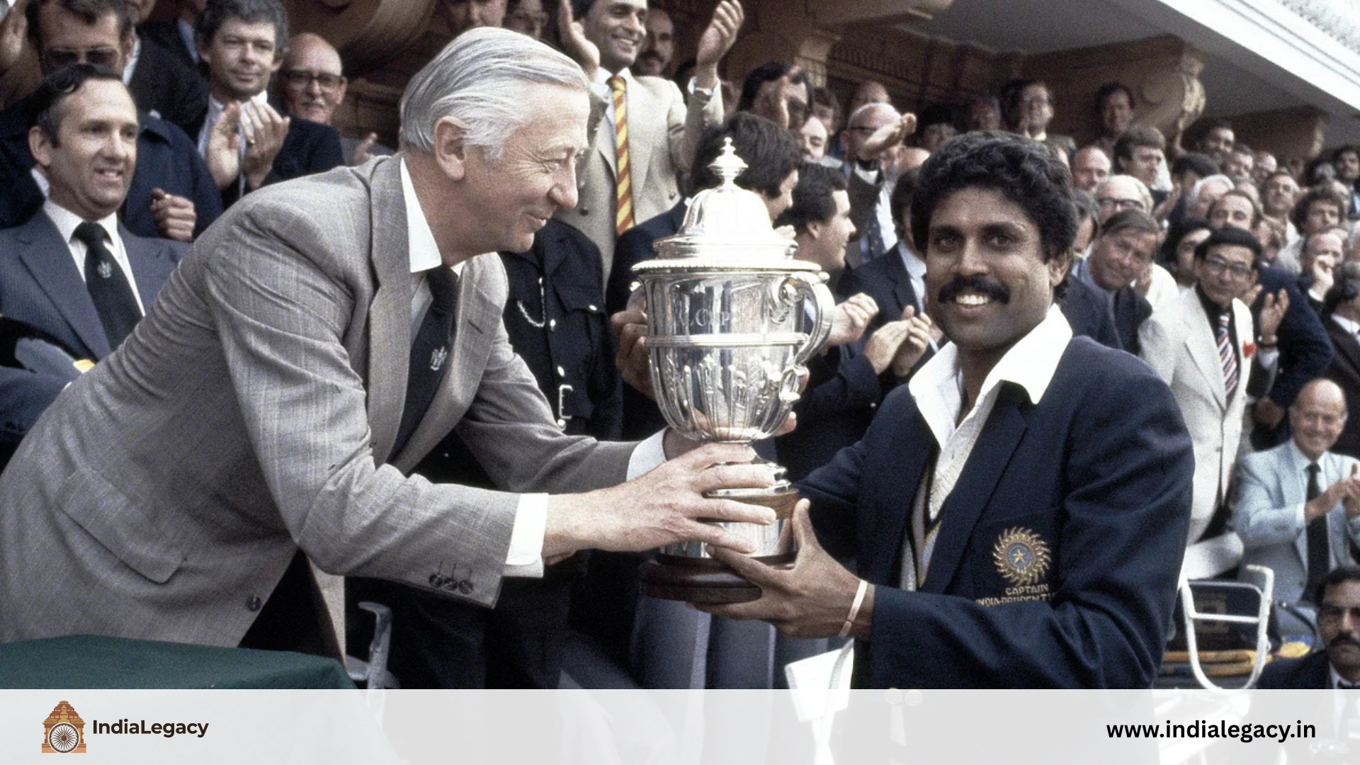 Kapil Dev holding 1983 Cricket World Cup trophy, historic moment in Indian cricket legacy – IndiaLegacy