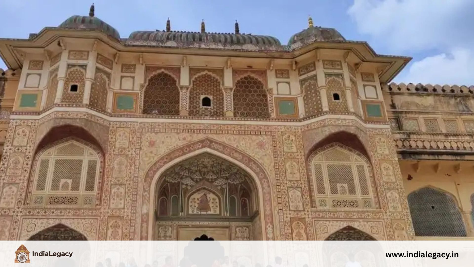 Ornate Rajput-Mughal gateway architecture at Amer Fort Jaipur with detailed frescoes and tilework indialegacy